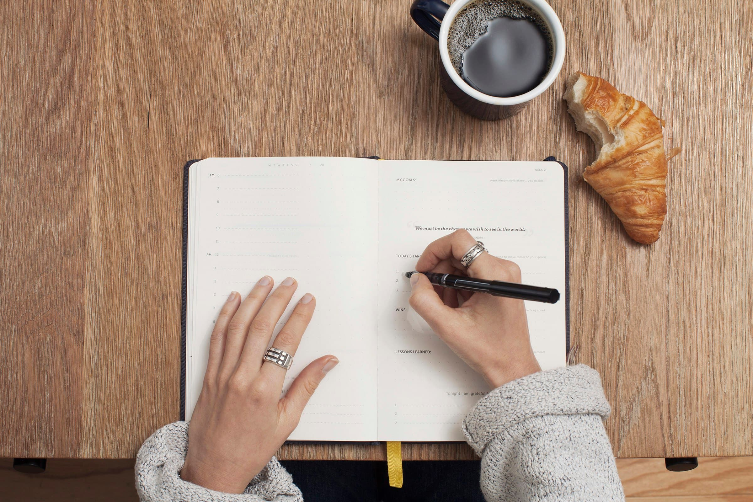 Pen and planning journal on a tidy financial planning desk